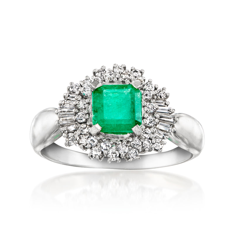 Platinum vintage-style ring with square emerald center and diamond halo, curved shank