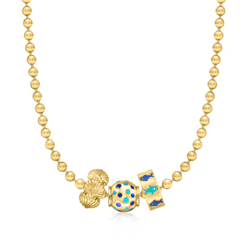 Gold bead charm with blue and turquoise enamel dots on a ball chain necklace