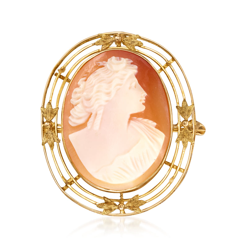 10kt yellow gold oval cameo pendant with brown shell center and decorative filigree