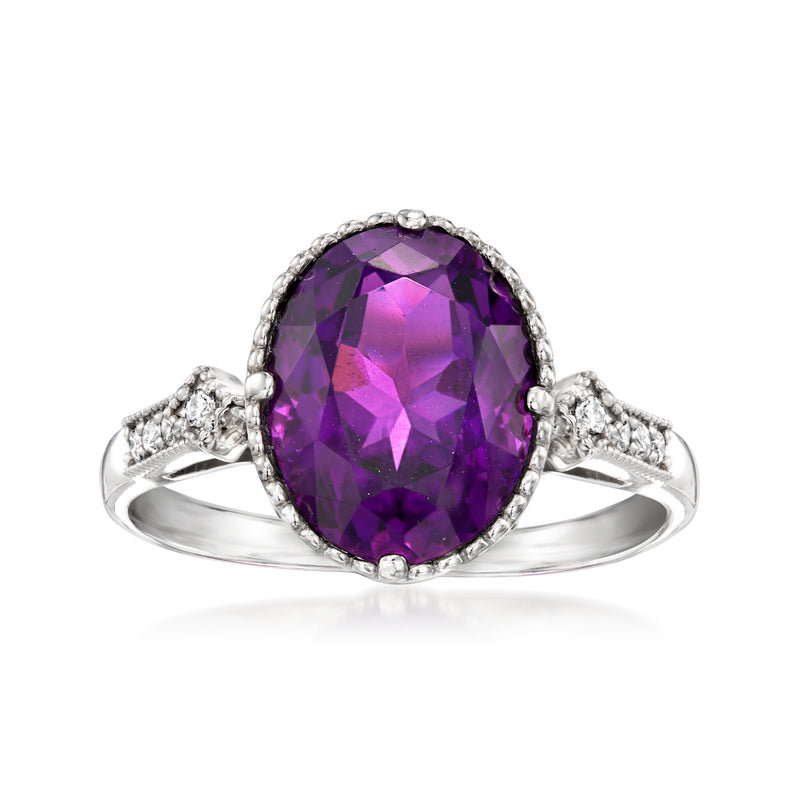 Platinum oval amethyst ring with diamond accents, faceted purple center stone
