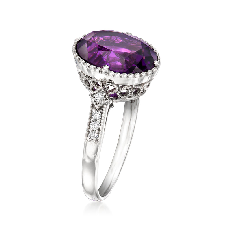 Platinum ring with oval purple amethyst center and diamond halo, split prongs