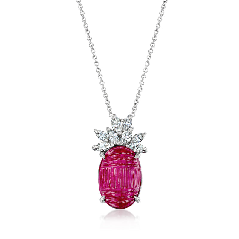 Vintage oval ruby pendant necklace with diamond cluster halo and platinum chain