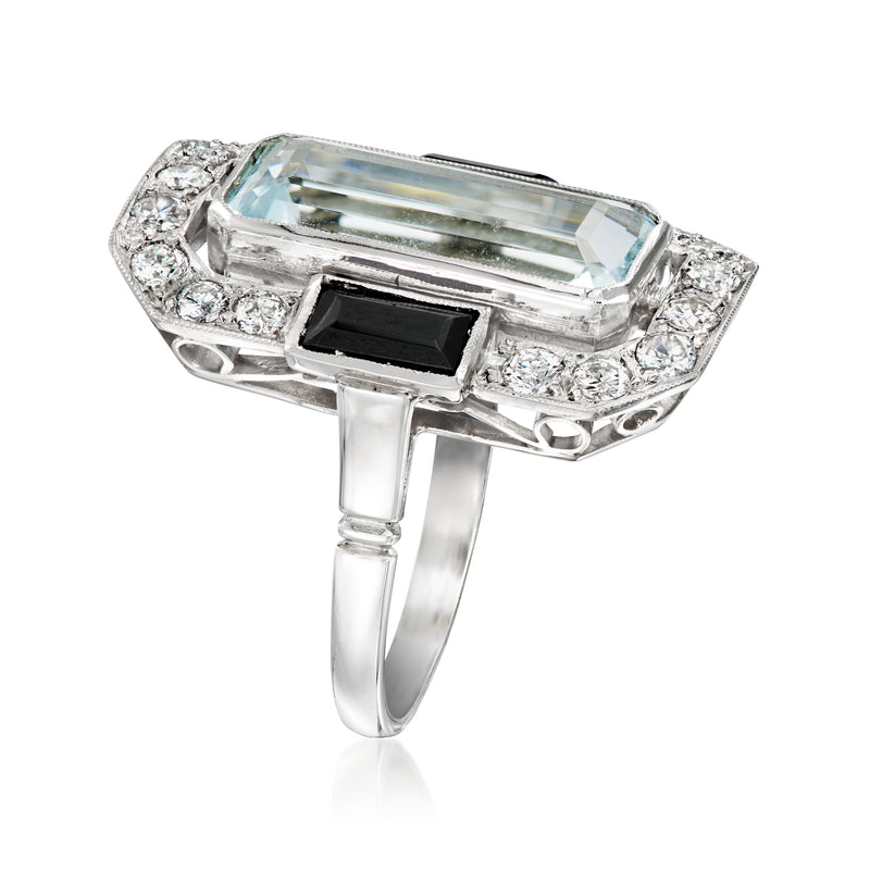 Platinum rectangular aquamarine ring with black onyx squares and diamond surrounding stones
