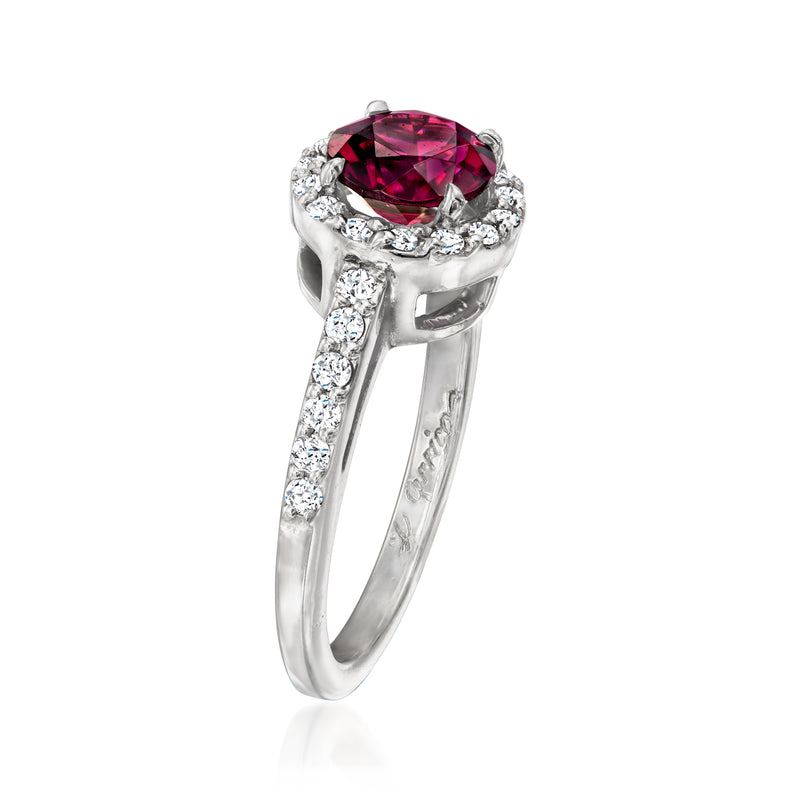 Platinum ring with oval rhodolite garnet and diamond halo, pavé diamond shank