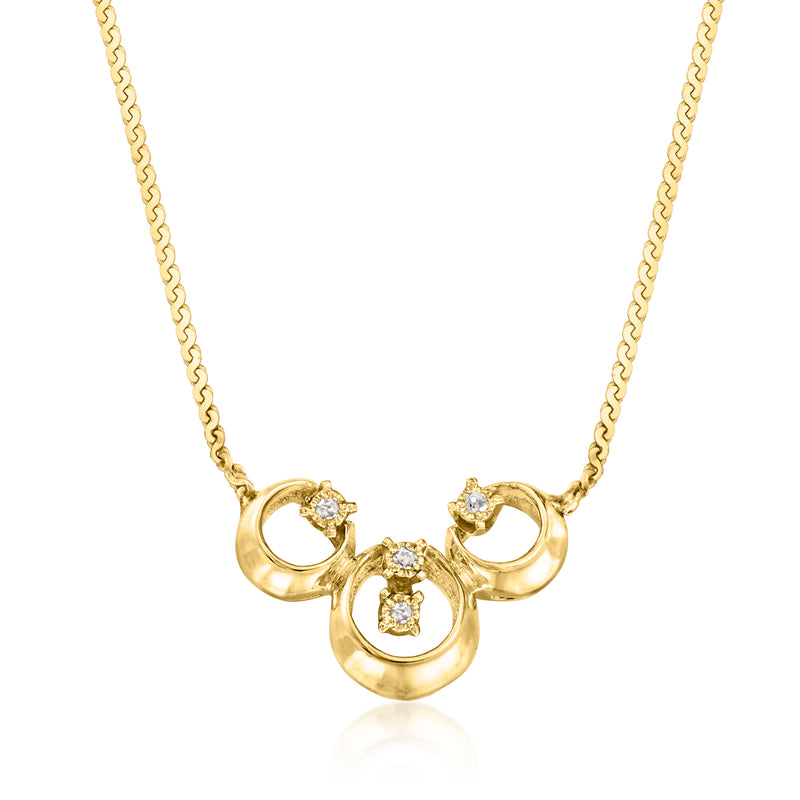 14kt yellow gold pendant necklace with three diamond-like circular motifs on chain