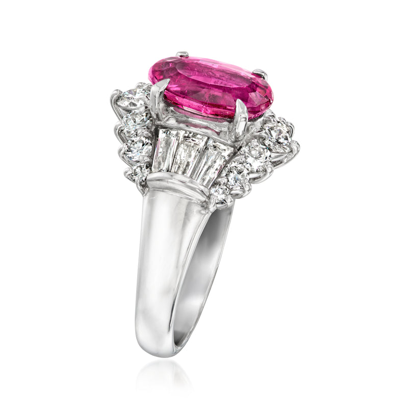 Platinum ring with oval pink tourmaline and baguette diamond accents, angled view