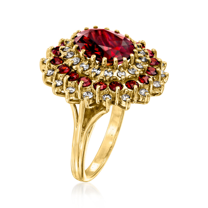 Round red garnet cluster ring in 18kt yellow gold, side view with diamond accents
