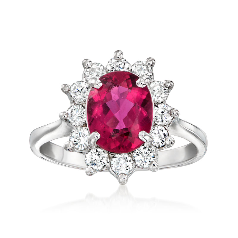 Pink tourmaline and diamond halo ring in white gold, oval center with prong setting