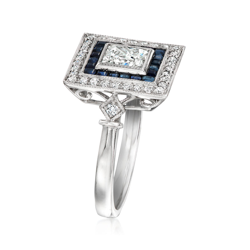 Angle view of platinum square ring with central diamond and blue sapphire frame