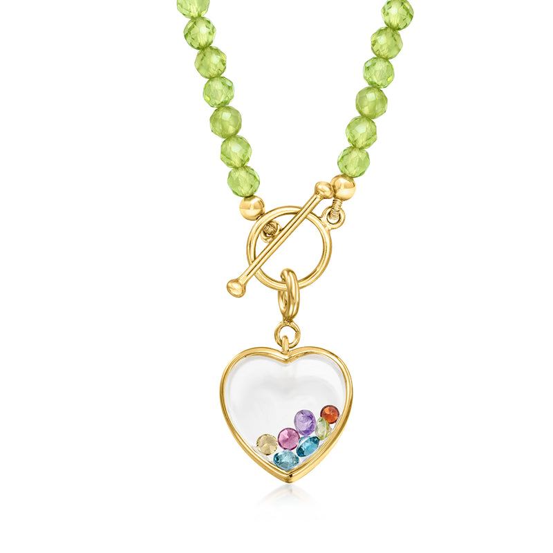 Heart charm with multicolor gemstones and gold bail on green beaded necklace