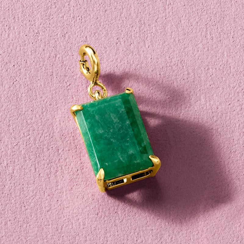 Gold emerald charm with prong-set emerald green rectangular stone