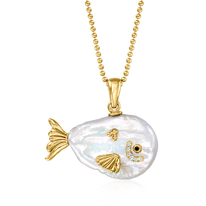 Gold fish pendant necklace with baroque pearl and gemstone eye detail