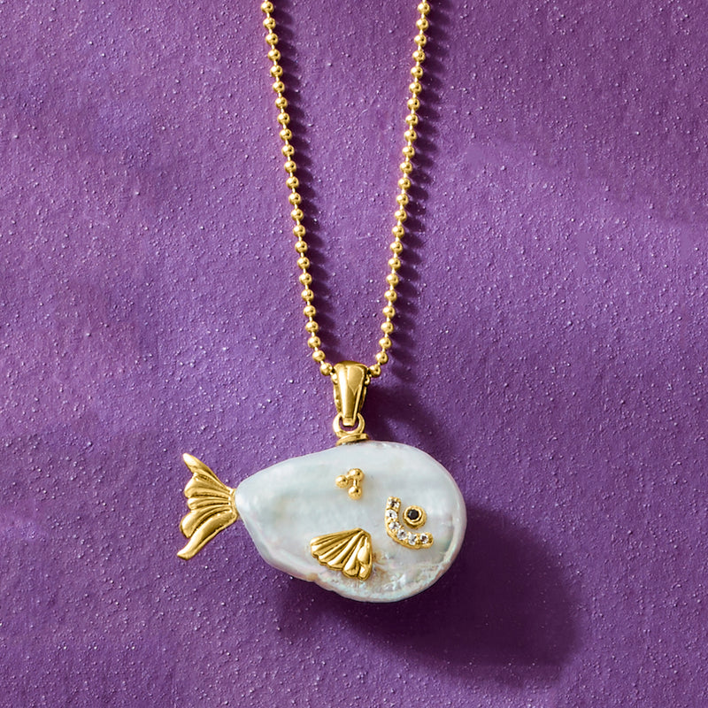 Gold fish pendant necklace with baroque pearl and round gemstone eye