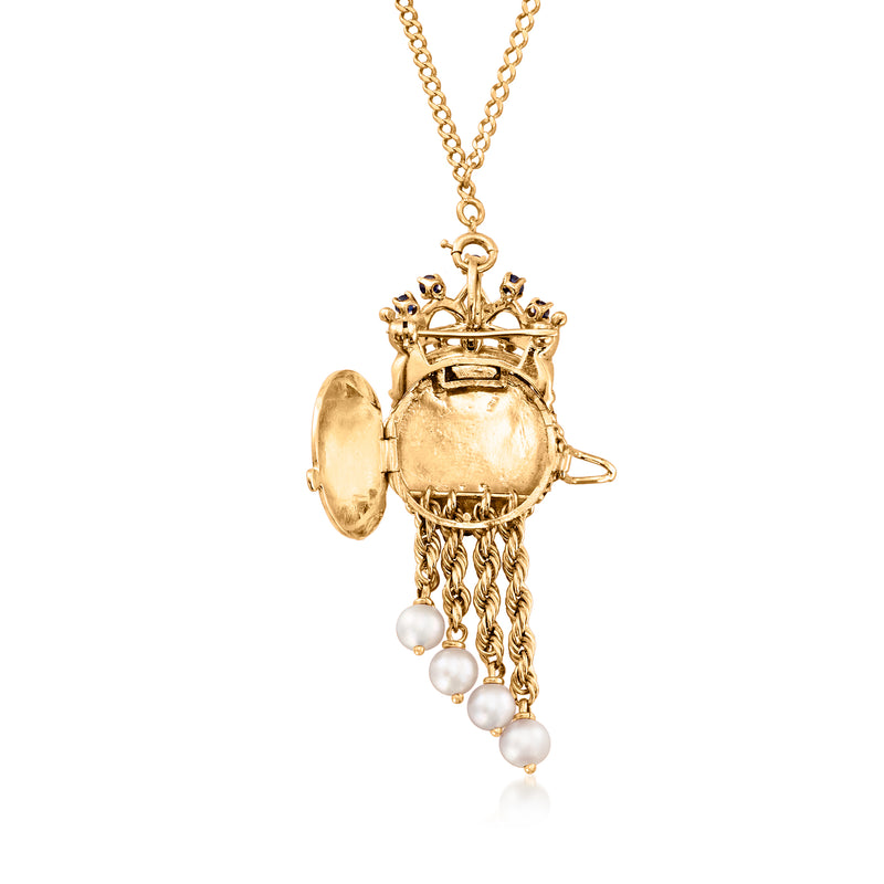 Gold-tone pendant necklace with domed back detail and dangling white pearl drops