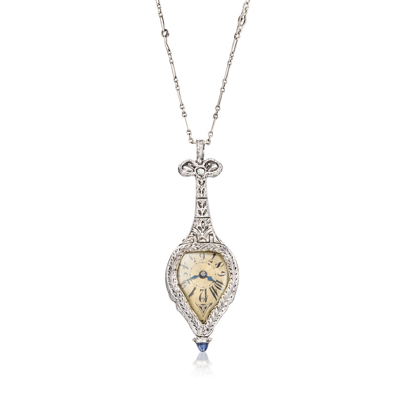 Diamond watch pendant necklace showing antique gold-tone dial on chain