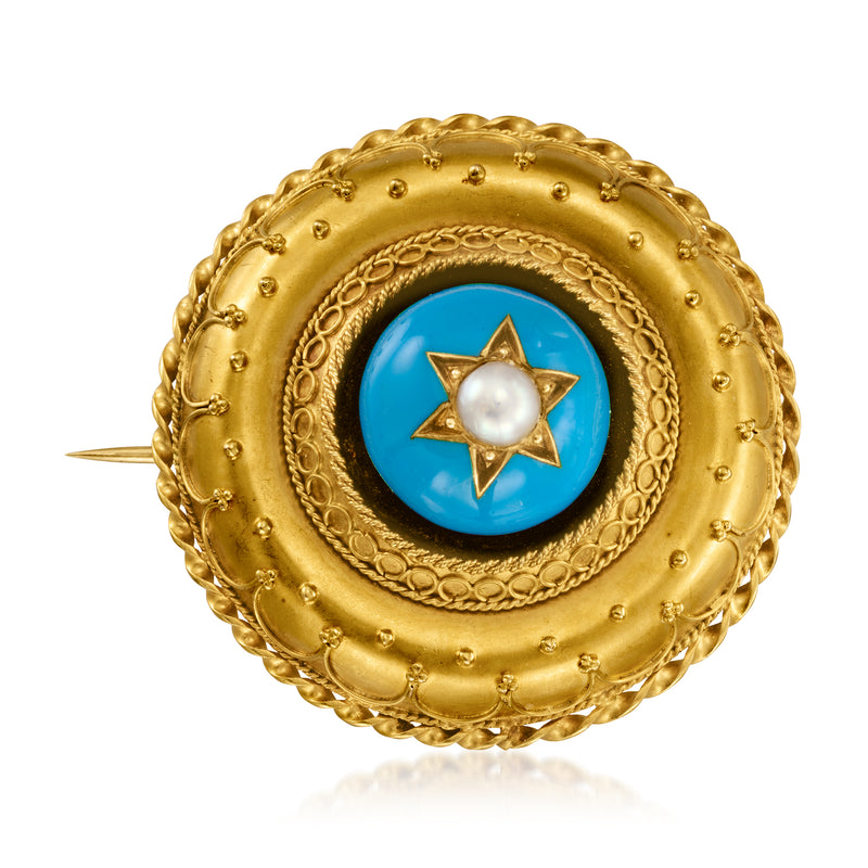 Round yellow gold-tone pin with blue resin center, star motif and white pearl