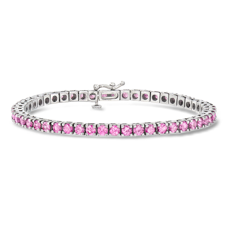 Pink sapphire tennis bracelet with bezel-set stones on 14k white gold link frame