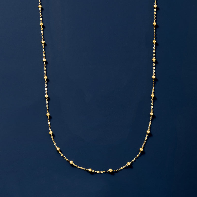 Yellow gold bead station necklace, long chain with evenly spaced round bead stations