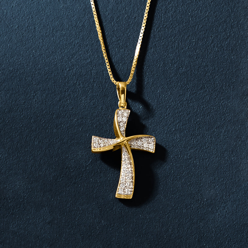 Diamond twisted cross pendant necklace in gold over sterling