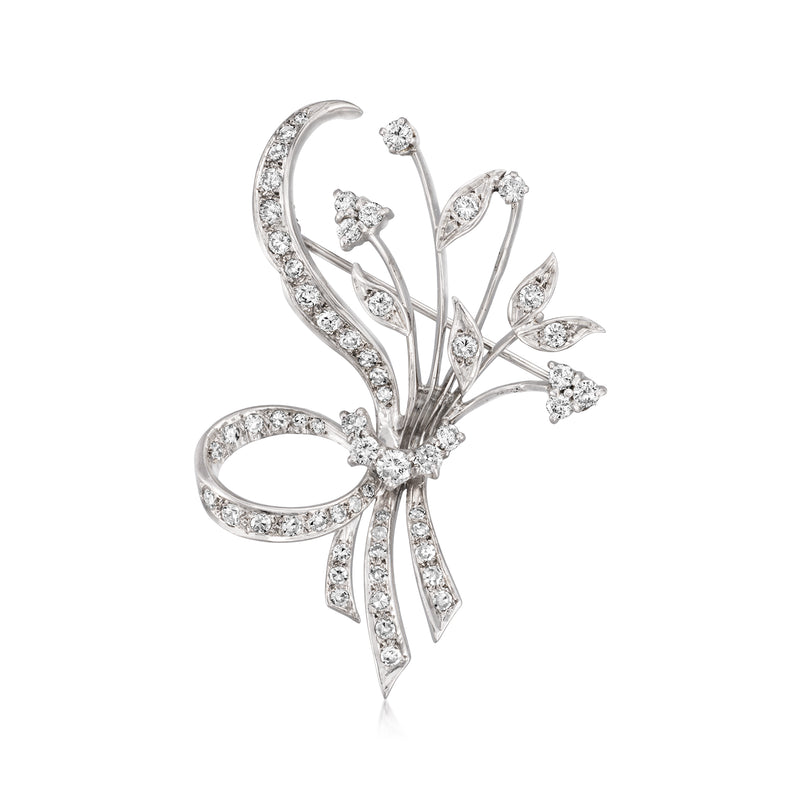Diamond floral spray pin in 14kt white gold, arched ribbon and leaf design