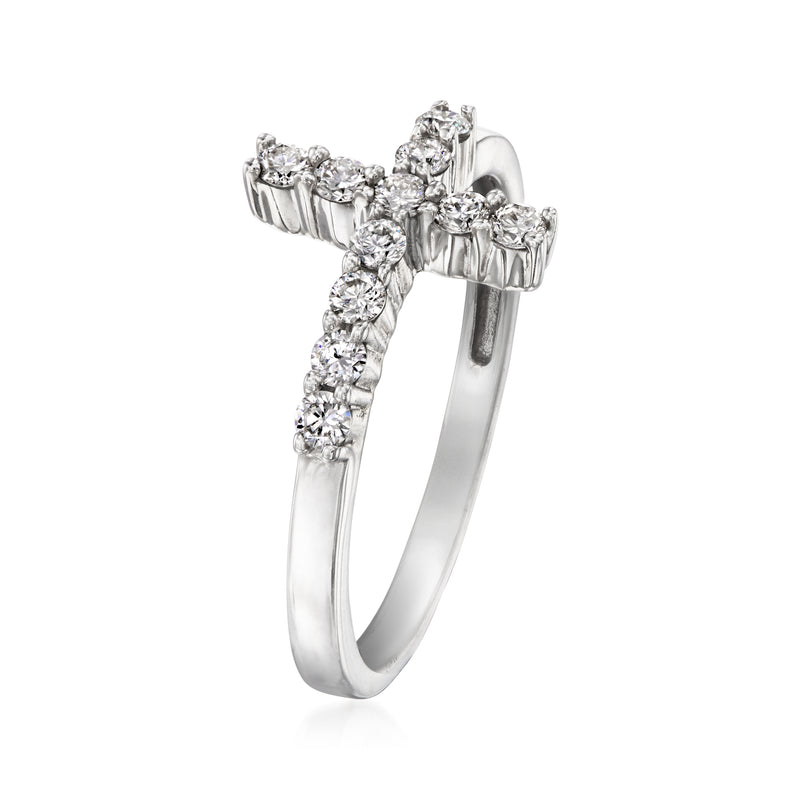 Sterling silver sideways cross ring with prong-set round diamonds, top side angle
