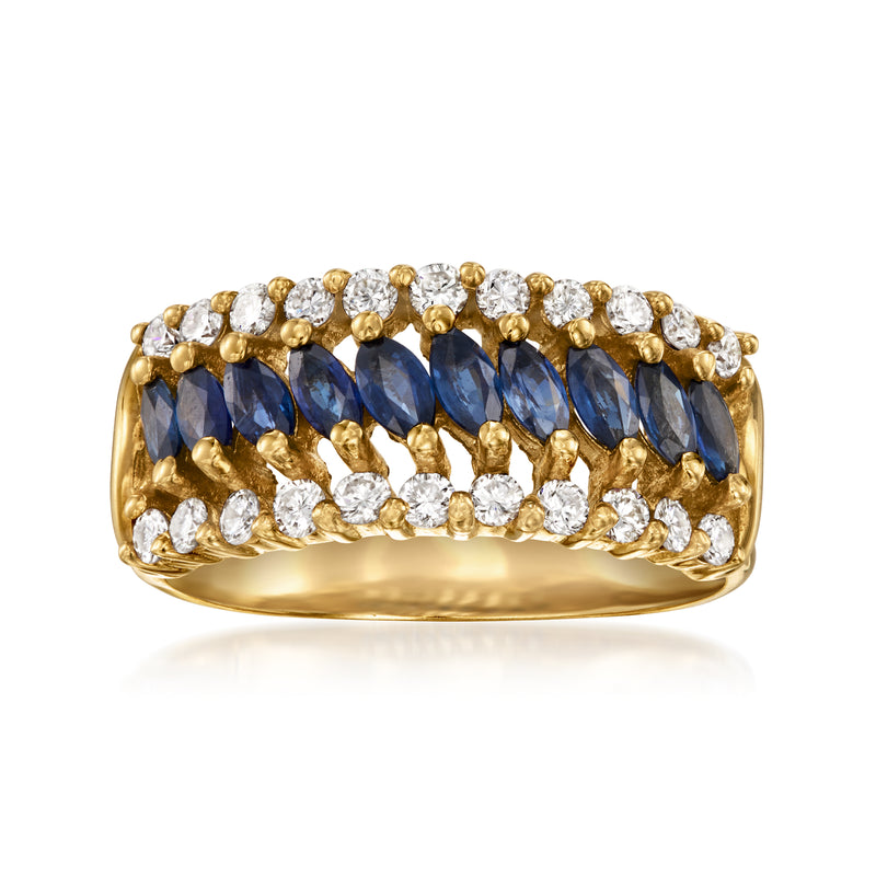 Yellow gold ring with blue sapphire row and round diamond accents, wide bezel setting