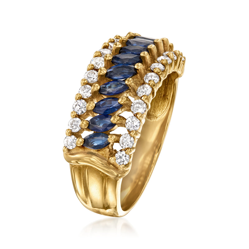 18kt yellow gold ring with blue sapphire marquise clusters and round diamond border