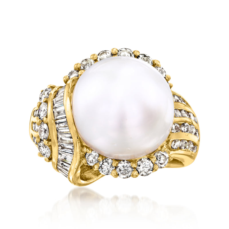 Vintage cultured pearl ring in 18k yellow gold with round diamond halo and side stones