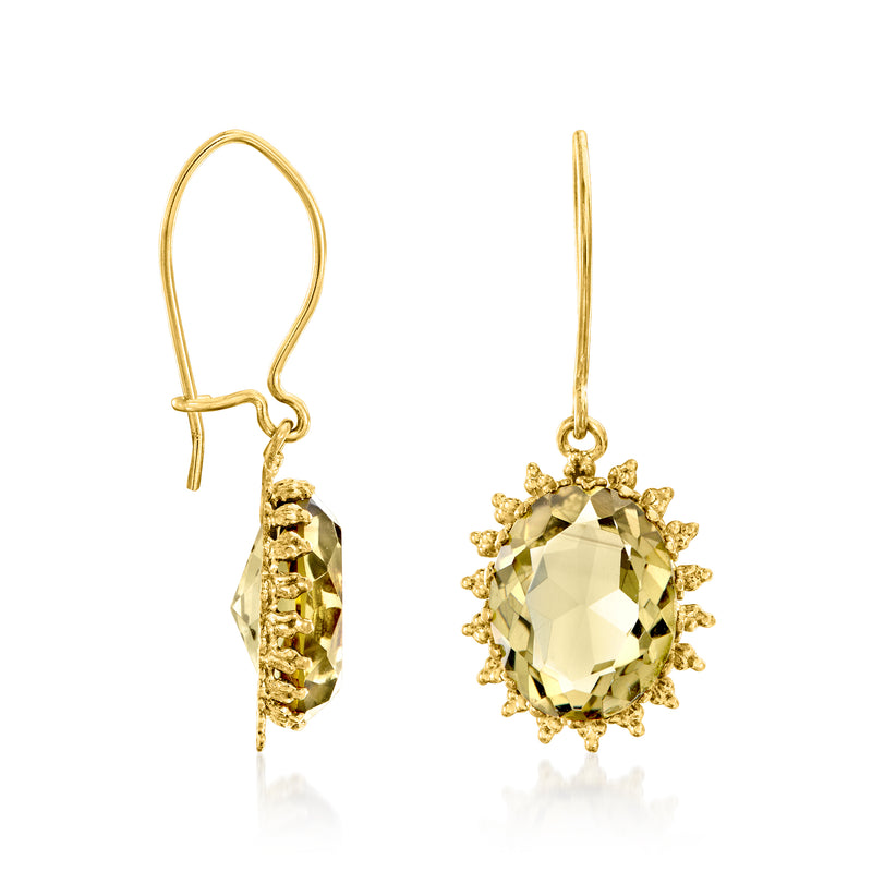 Yellow gold citrine drop earrings, side view with prong-set oval gemstone halo