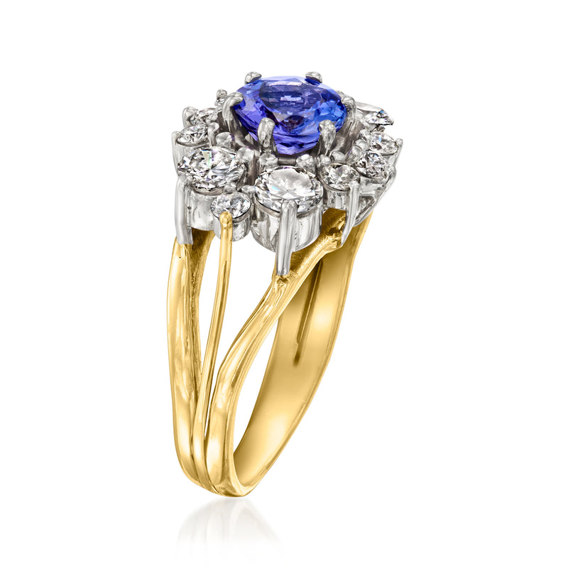 14kt yellow gold ring with oval blue center stone set in a diamond cluster halo
