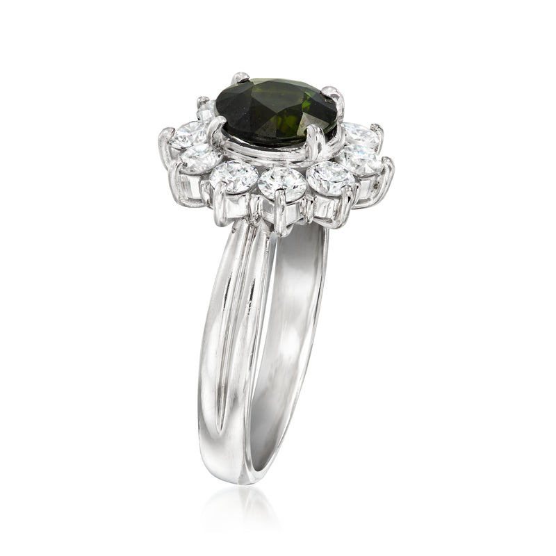 Platinum ring side view with green round tourmaline set in diamond halo