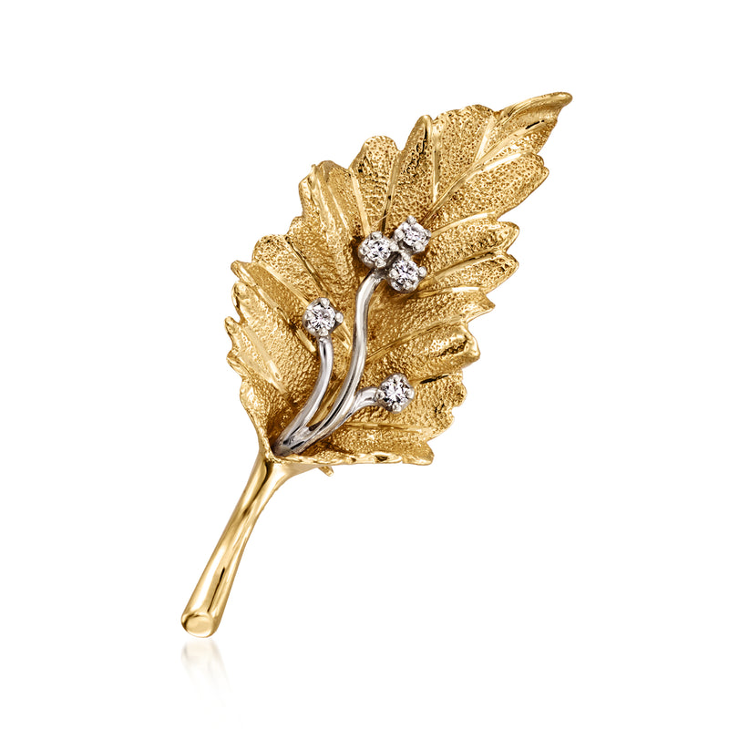Gold leaf diamond lapel pin with two-tone metal and round-cut stones