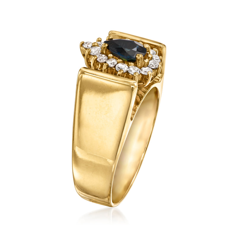 Vintage 14kt yellow gold ring with oval sapphire and diamond halo