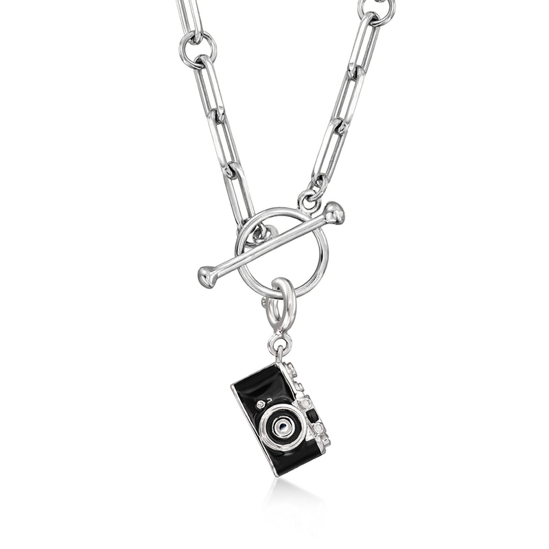 Sterling silver camera charm pendant with black enamel and circular lens on chain