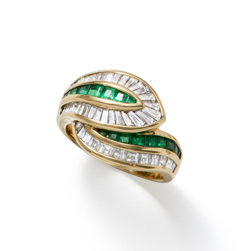 18kt yellow gold emerald green and diamond crossover ring, angled top view
