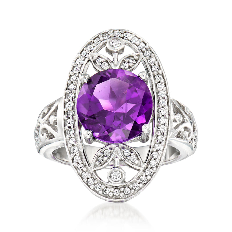 14kt white gold amethyst cushion ring with diamond halo and openwork setting