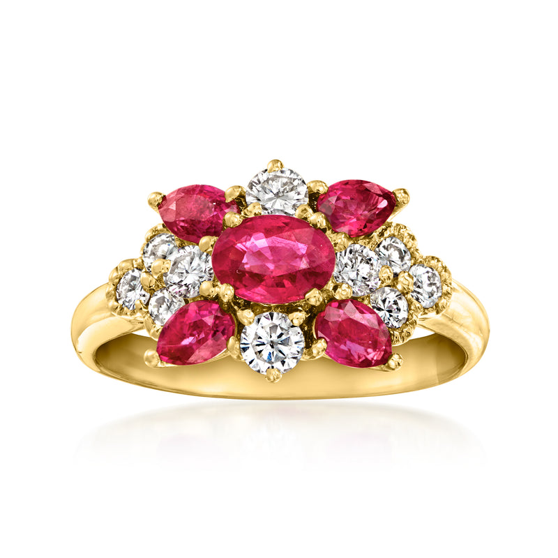 18kt yellow gold ruby and diamond cluster ring with oval pink center stone