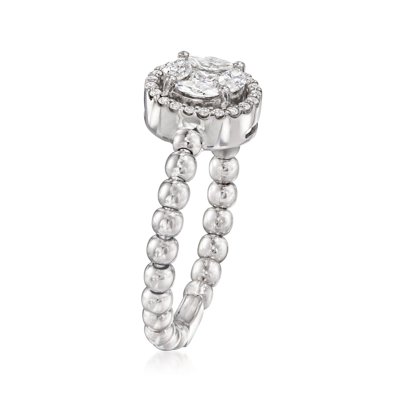 White gold diamond ring with oval center stone, halo, and beaded band links