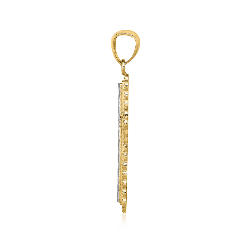 Two-tone 14kt gold cross pendant side view with diamond-cut detailing and bail
