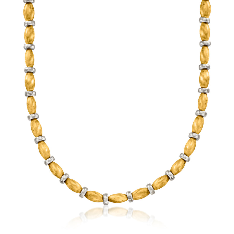 Two-tone gold beaded necklace with oval bead links and small white gold spacers
