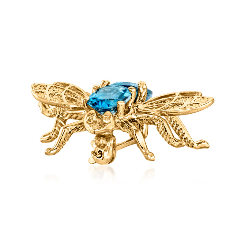 Vintage bumblebee pin with yellow gold wings and two blue gemstone accents