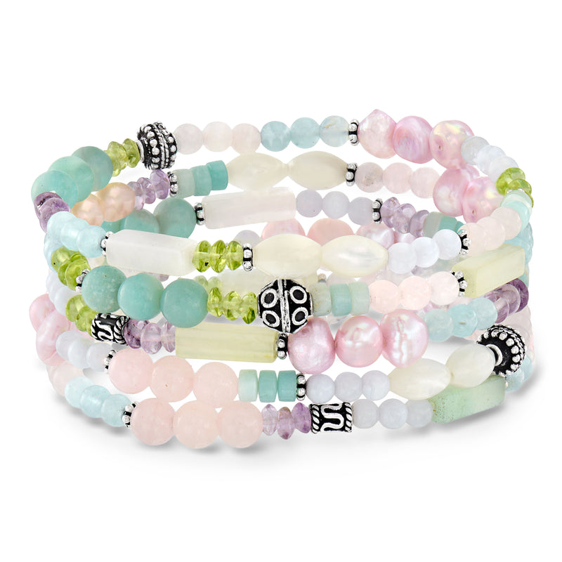 Set of five pastel bead stretch bracelets with sterling silver tone spacers