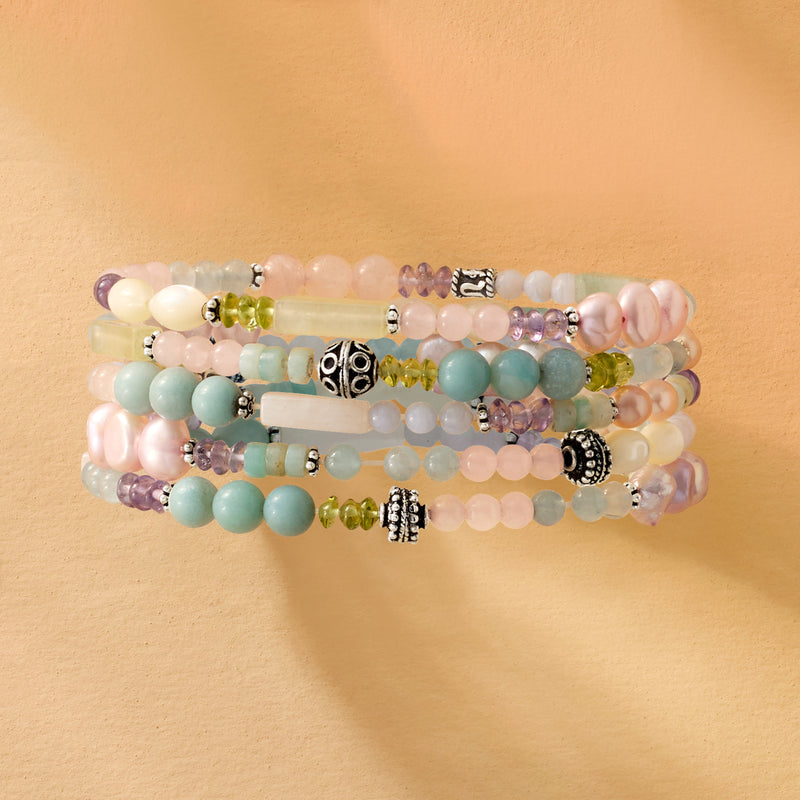 Five pastel gemstone bead stretch bracelets with silver-tone charm spacers