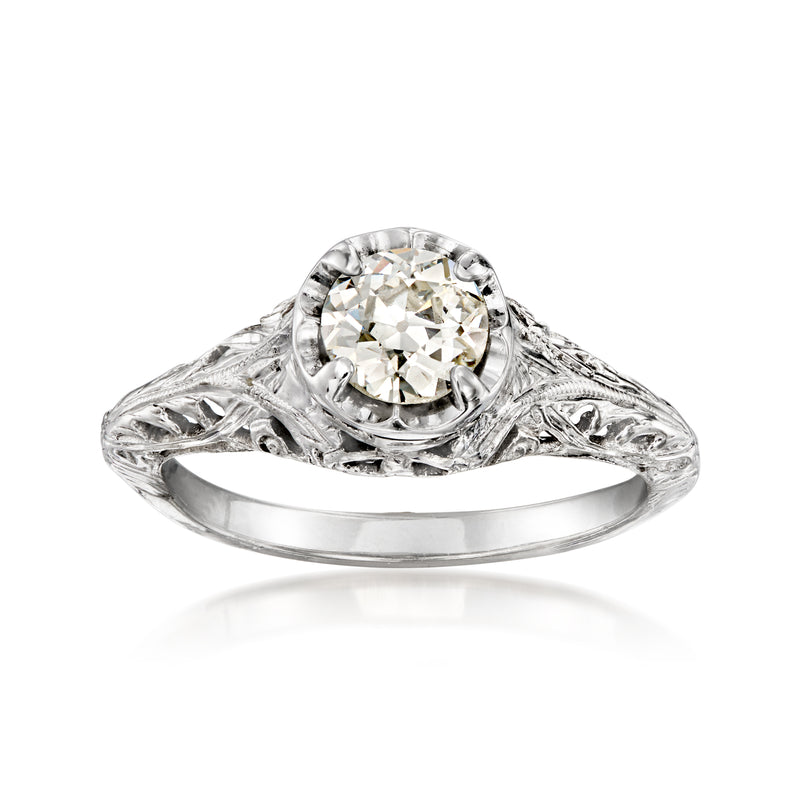 Vintage 14kt white gold diamond ring with round center stone and ornate milgrain setting