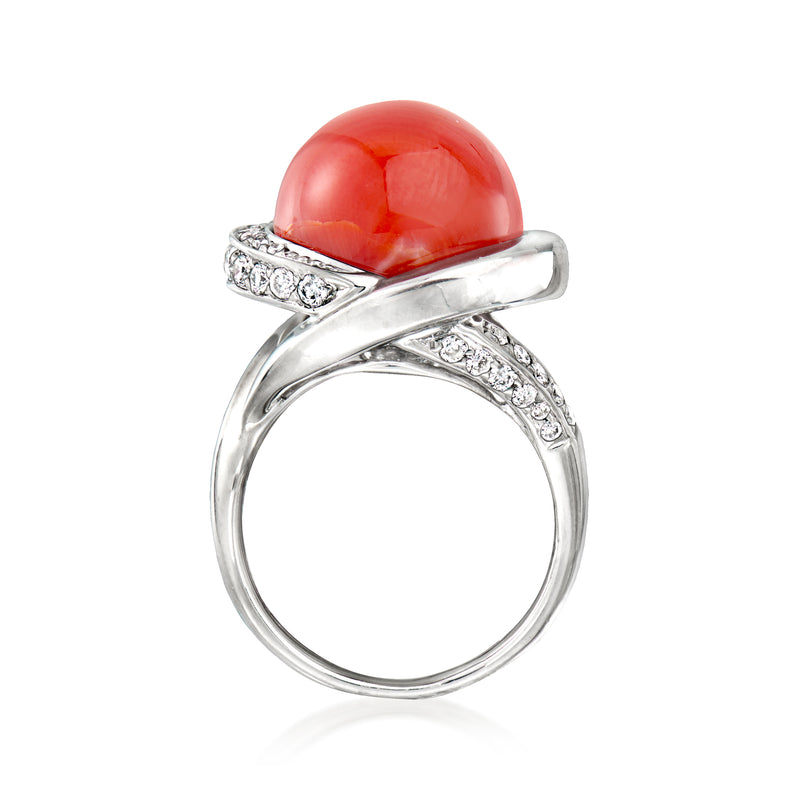Vintage coral ring in platinum with domed coral cabochon and diamond accents