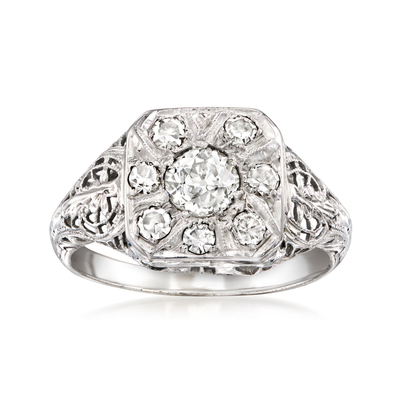 Vintage 18kt white gold diamond filigree ring with clustered round stones, openwork sides