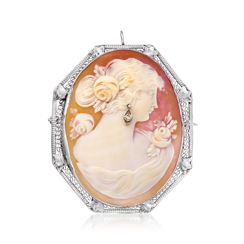Vintage oval cameo pin/pendant with white gold filigree frame and small diamond detail