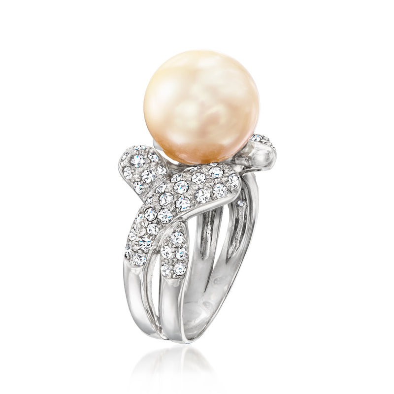 Vintage pearl and diamond ring, large cream pearl on prong setting with clustered round diamonds