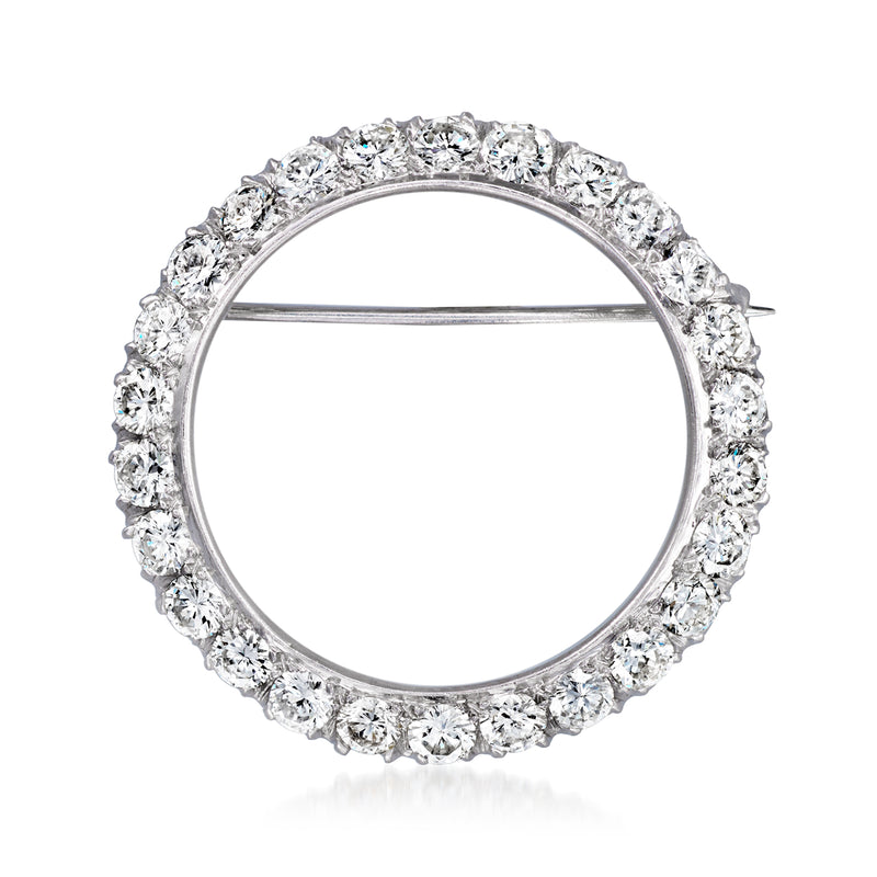 Platinum round diamond halo pin with prong-set stones and straight pin back