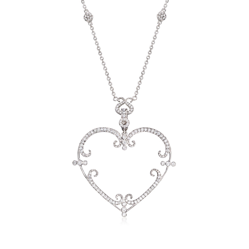 Diamond heart necklace in white gold with ornate scroll detail